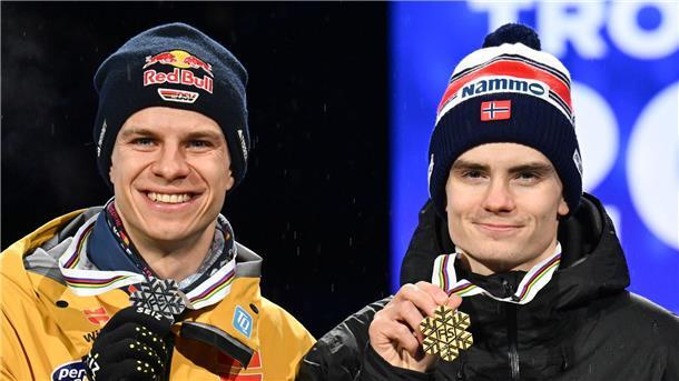 Anzug-Skandal im Skispringen: Wellinger glaubt Lindvik nicht Bei der Siegerehrung mit Marius Lindvik ahnte Andreas Wellinger (l) noch nicht, was sich später entwickeln würde.