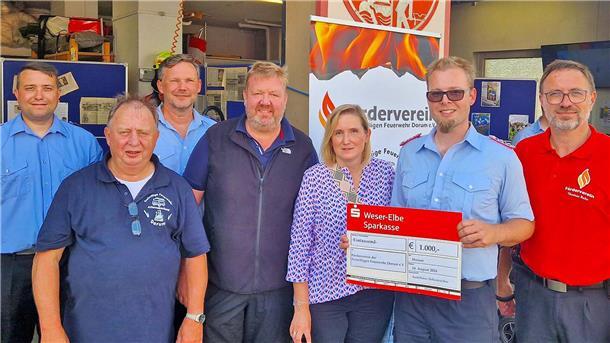 Autohaus Egon Schumacher spendiert Feuerwehr 1.000 Euro
