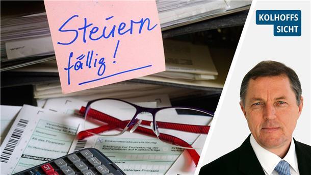 Bloß nicht allzu genau werden, liebe Sozialdemokraten! Steuerformulare, Belege sowie Brille und Taschenrechner liegen auf einem Tisch.