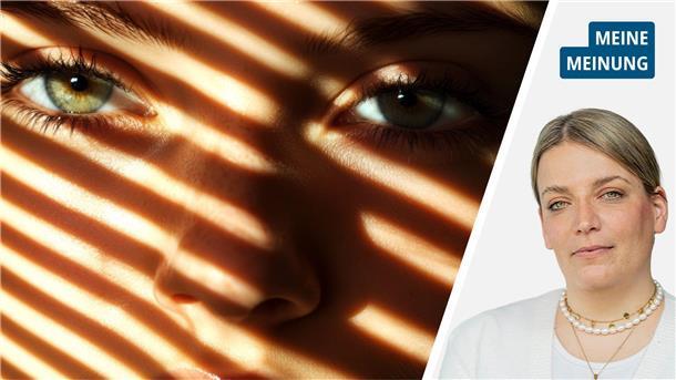 Schatten fallen auf das Gesicht einer jungen Frau.