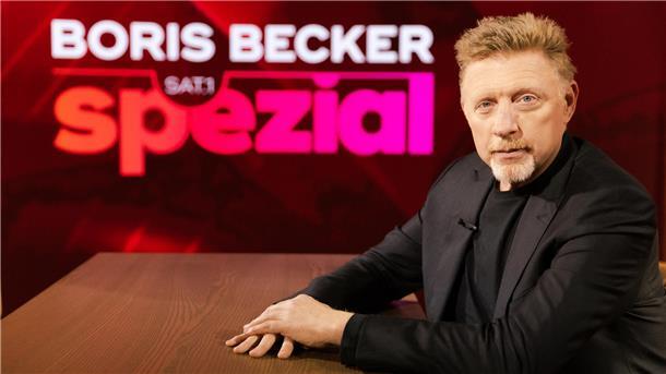 Ex-Tennisstar Boris Becker sitzt vor dem Schriftzug "Boris Becker Sat.1 Spezial".