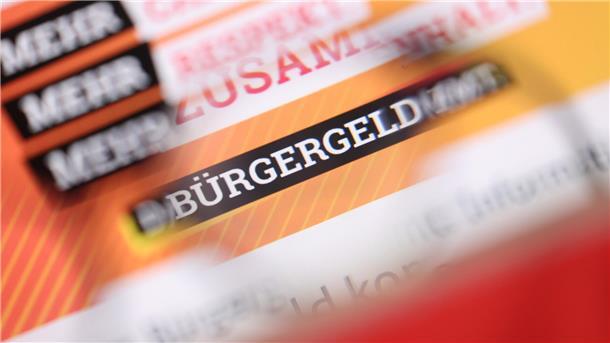 «Bürgergeld» ist auf der Homepage des Bundesministeriums für Arbeit und Soziales durch eine Brille zu lesen.