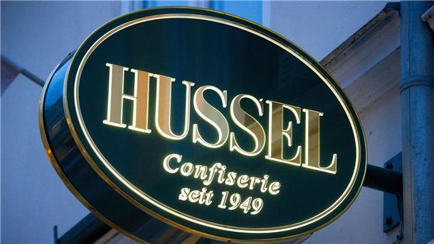Das Logo der Confiserie „Hussel“.