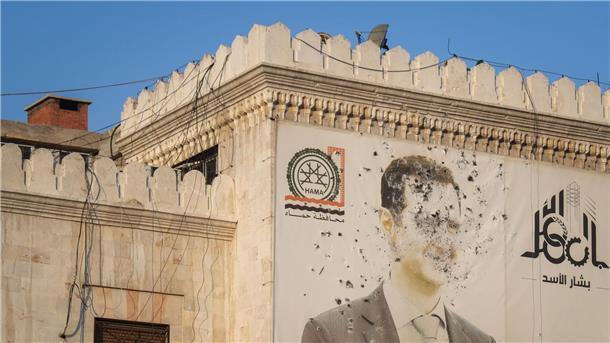 Parlamentswahl in Syrien: Schritt zum demokratischen Wandel? Der fast 14-jährige Bürgerkrieg hat Syrien tief gespalten.