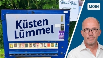 Kondomautomat mit der Aufschrift „Küstenlümmel“.