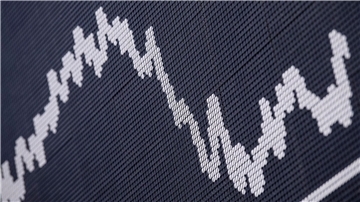 Die Dax-Kurve im Handelssaal der Deutschen Börse in Frankfurt.