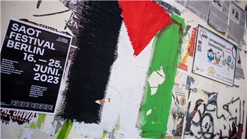 Eine palästinensische Flagge ist an eine Wand in Berlin-Neukölln gemalt.