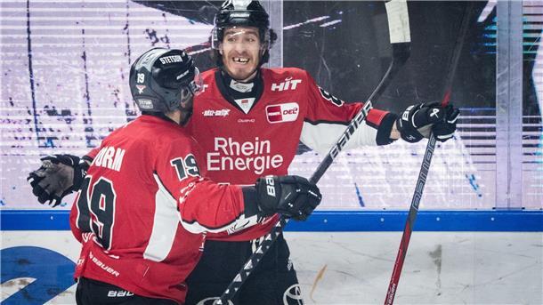 Köln erstmals seit 2014 im Finale - Duell gegen Berlin Gregor MacLeod (r) bringt Köln in die Overtime.