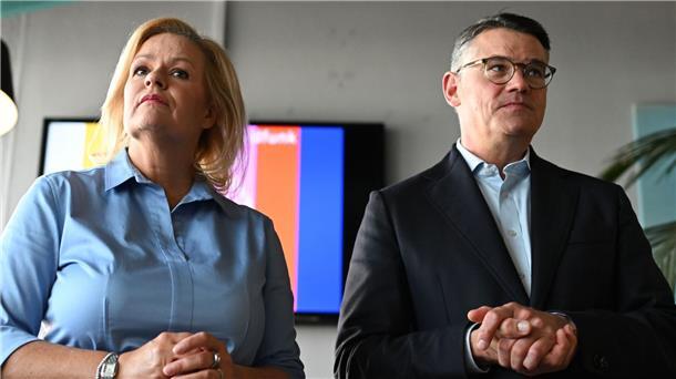 Hessen: CDU und SPD haben Koalitionsvertrag unterzeichnet Künftige Koalitionäre: Nancy Faeser (SPD) und Ministerpräsident Boris Rhein (CDU).