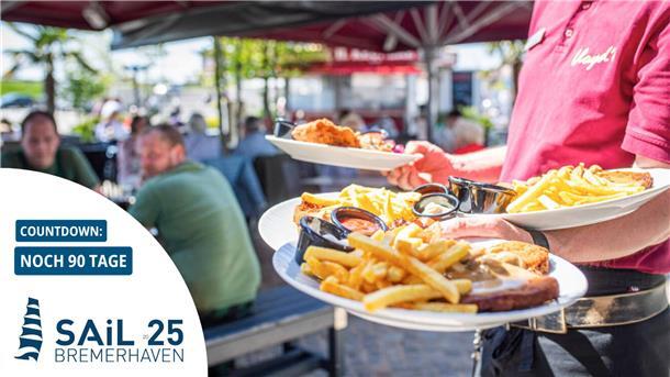Die Ruhe vor dem Sturm: Bremerhavens Gastro-Szene wappnet sich für die Sail Im Blickpunkt die Außengastronomie am Neuen Hafen, die aufgrund des gesunkenen Inzidenzwertes und damit verbundenen Corona-Lockerungen in Bremerhaven für Gäste wieder öffnet. Im Bild: Deftiges für die hungrigen Gäste im Restaurant "Lloyds".