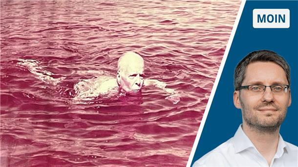 Mit ein bisschen Fantasie springt der Präsident in die Nordsee Ein Mann, der im Wasser schwimmt.