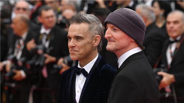 „Killers of the Flower Moon“: Scorseses Western-Krimi Robbie Williams (l) und Filmemacher Michael Gracey in Cannes.