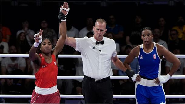 Boxerin Ngamba sichert Flüchtlingsteam erste Olympiamedaille Sie hat es geschaft: Boxerin Ngamba holt die erste Olympia-Medaille für das Flüchtlingsteam.