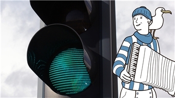 Eine Ampel und Hein Mück Symbol daneben.