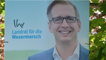 Stephan Siefken ist auf einem Wahlplakat zu sehen. 