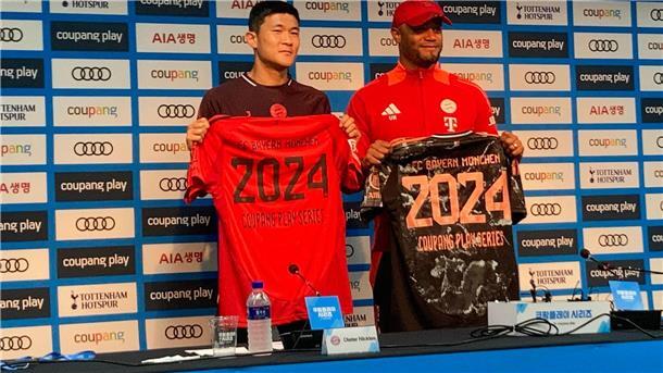 Trainer Vincent Kompany (r) und Minjae Kim vor dem Testspiel gegen Tottenham Hotspur im World Cup Stadium.