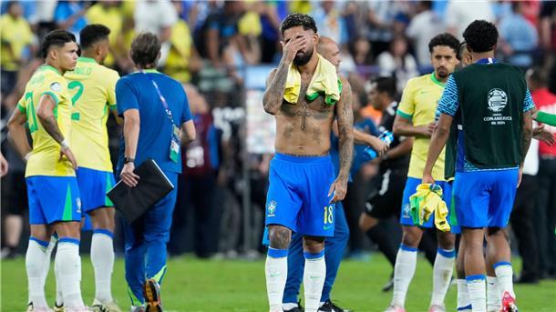 Uruguay schlägt Brasilien im Copa-Viertelfinale Trauer bei den brasilianischen Spielern: Douglas Luiz hält sich die Hand vor das Gesicht.